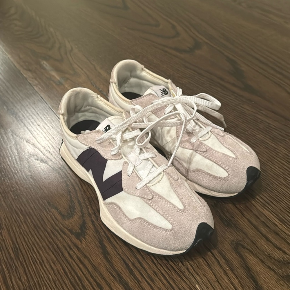 Beige, white, and black New Balance 327